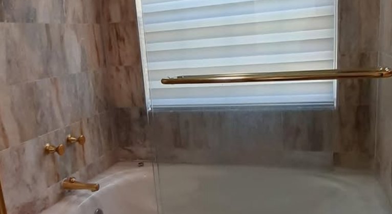 Bathroom shade above a soaking tub