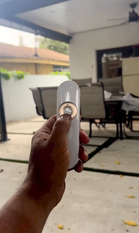 Motorized patio screen on the remote